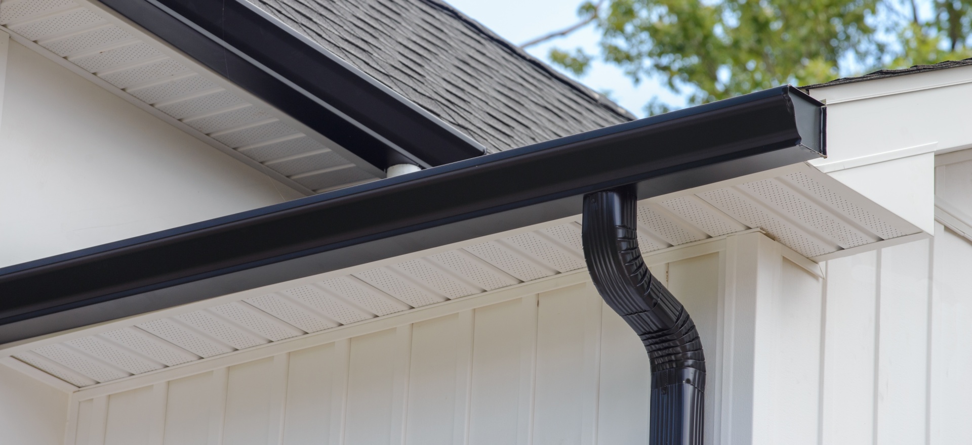 Stock Image for Gutter work < laptop devices Bellatrix Roofing & Restoration