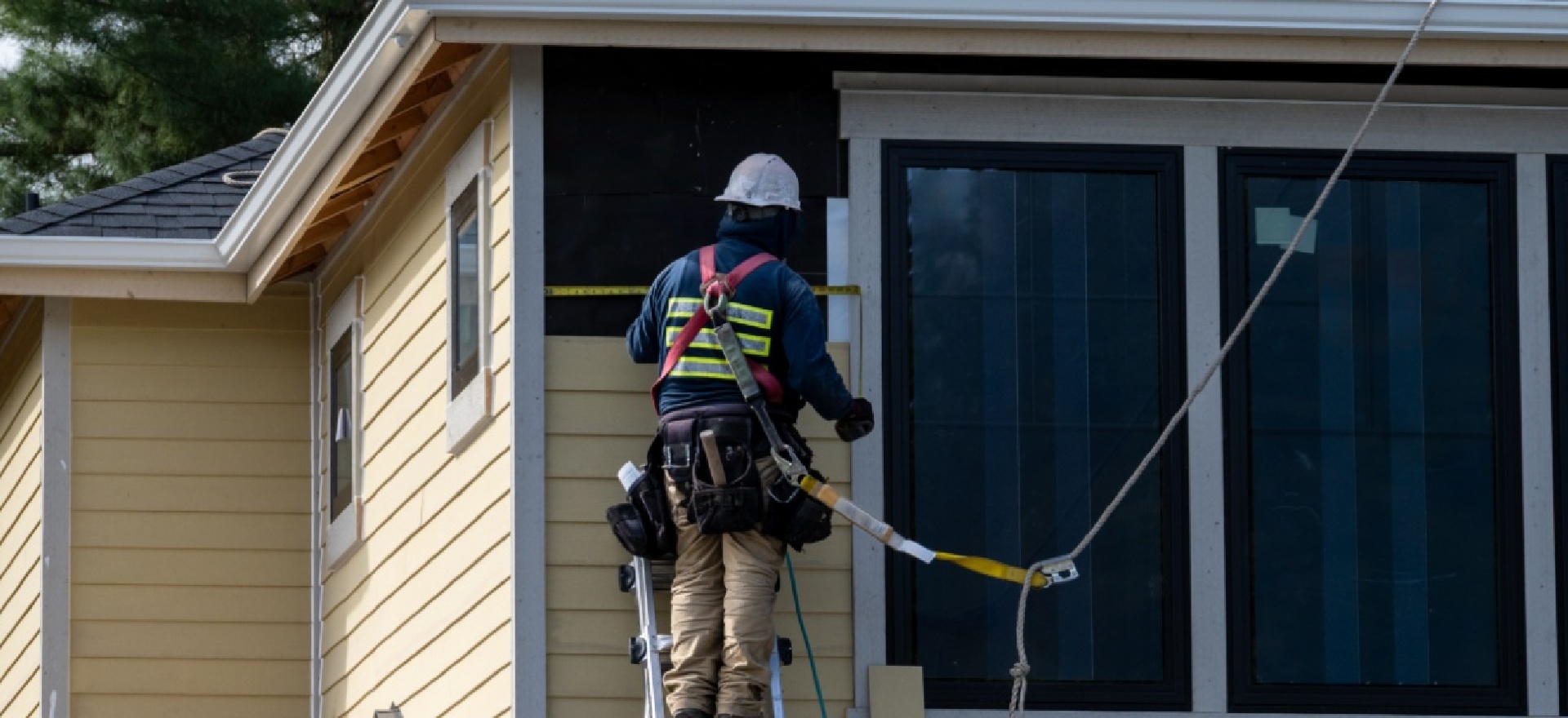 Stock Siding Image < laptop devices for West Chester | Bellatrix Roofing & Restoration”
